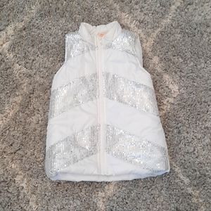 A white vest with grey sequence from faded glory